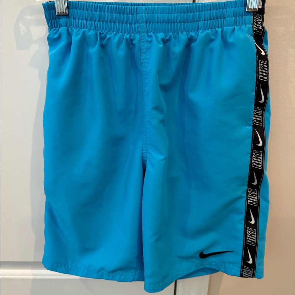 Nike boys youth XL swim suit with front tie, mesh liner and side pockets